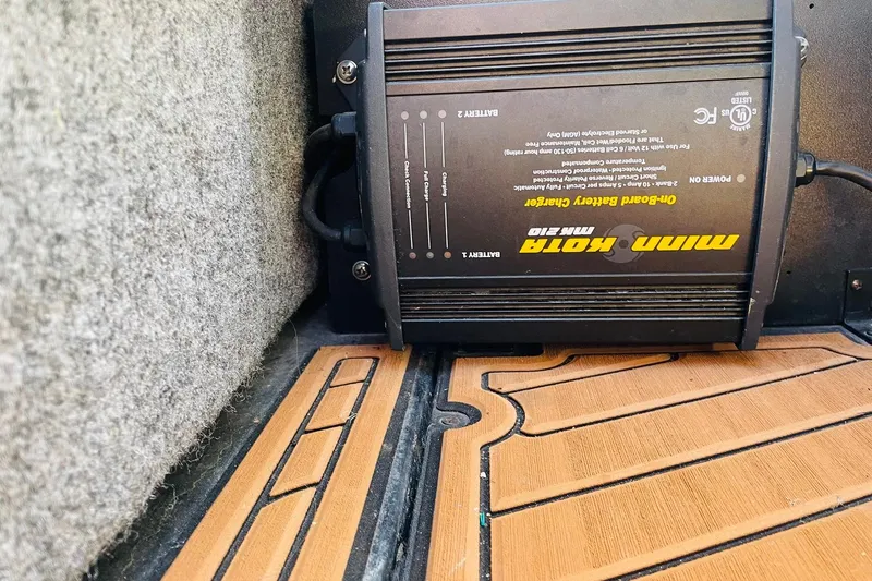 Slide: The Image of On-board battery charger in 2015 Nautique Super Air Nautique G23 boat. - 34