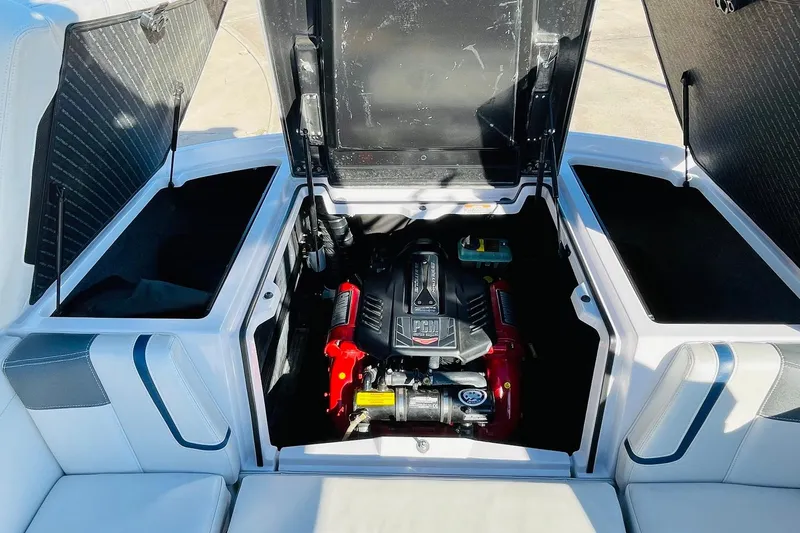 Slide: The Image of 2015 Nautique Super Air Nautique G23 engine compartment with PCM engine visible. - 49