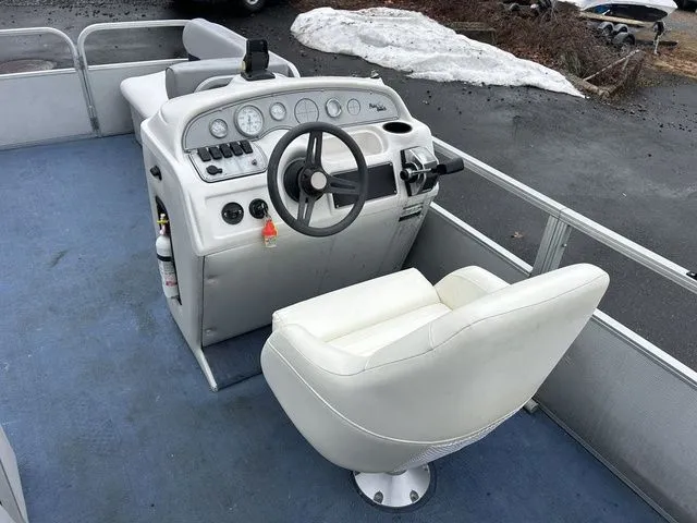 Slide: The Image of Cockpit of a 1998 Palm Beach 200 pontoon boat. - 5