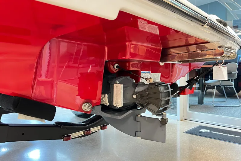 Slide: The Image of 2024 Yamaha Boats AR195 rear view showcasing red hull and propulsion system. - 3