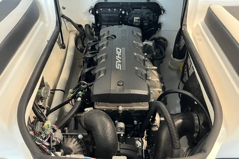 Slide: The Image of 2024 Yamaha Boats AR195 engine compartment showcasing powerful SYHO engine. - 9