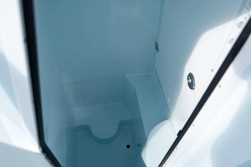 Slide: The Image of Interior view of 2024 Contender 25 Tournament boat's storage compartment. - 8