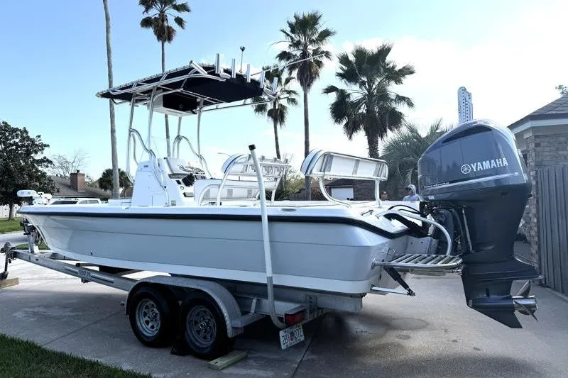 Slide: The Image of 2012 Edgewater 240 Inshore boat on trailer with Yamaha outboard motor. - 10