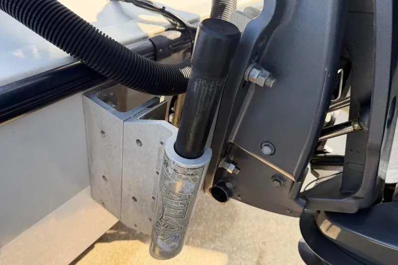 Slide: The Image of Close-up of 2012 Edgewater 240 Inshore boat motor mount and hydraulic system. - 19