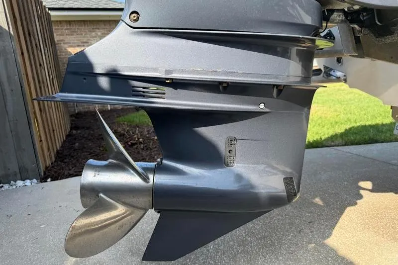 Slide: The Image of Close-up of a 2012 Edgewater 240 Inshore boat motor propeller. - 22