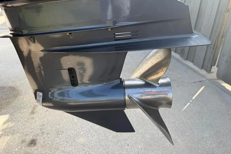 Slide: The Image of Close-up of a 2012 Edgewater 240 Inshore boat propeller and lower unit. - 23