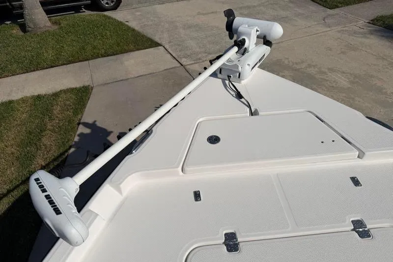 Slide: The Image of 2012 Edgewater 240 Inshore boat with trolling motor on deck. - 29