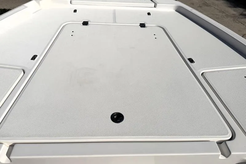 Slide: The Image of 2012 Edgewater 240 Inshore boat deck, featuring a spacious, clean surface. - 34