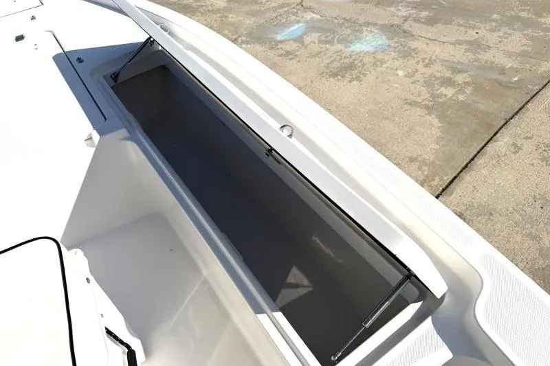Slide: The Image of Open storage compartment on a 2012 Edgewater 240 Inshore boat. - 38