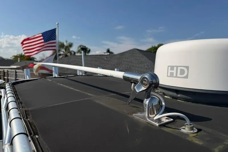 Slide: The Image of Edgewater 240 Inshore boat with HD radar and American flag, 2012 model. - 43
