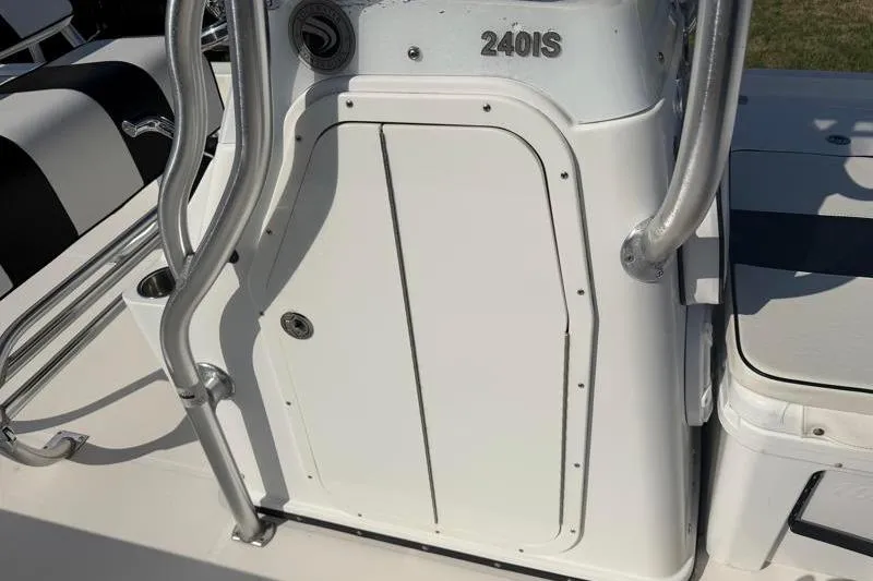 Slide: The Image of 2012 Edgewater 240 Inshore boat console with stainless steel railings. - 46