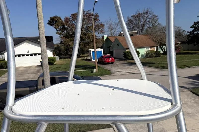 Slide: The Image of Aluminum boat tower on 2012 Edgewater 240 Inshore, residential street background. - 5