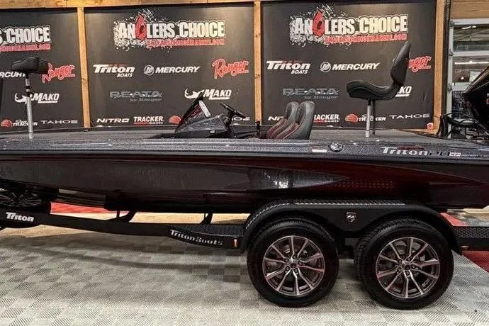 The Image of 2026 Triton 20XP Patriot boat on display at Anglers Choice event. - 1