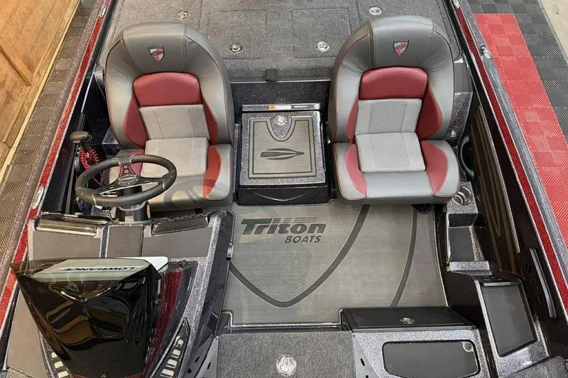 Slide: The Image of 2026 Triton 20XP Patriot boat interior with dual seats and steering console. - 10