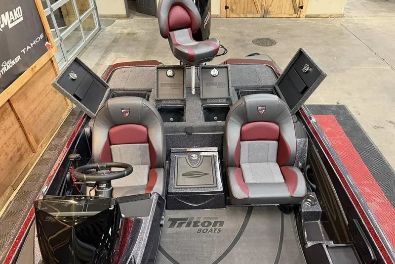 Slide: The Image of Interior of 2026 Triton 20XP Patriot boat with red and gray seating. - 12