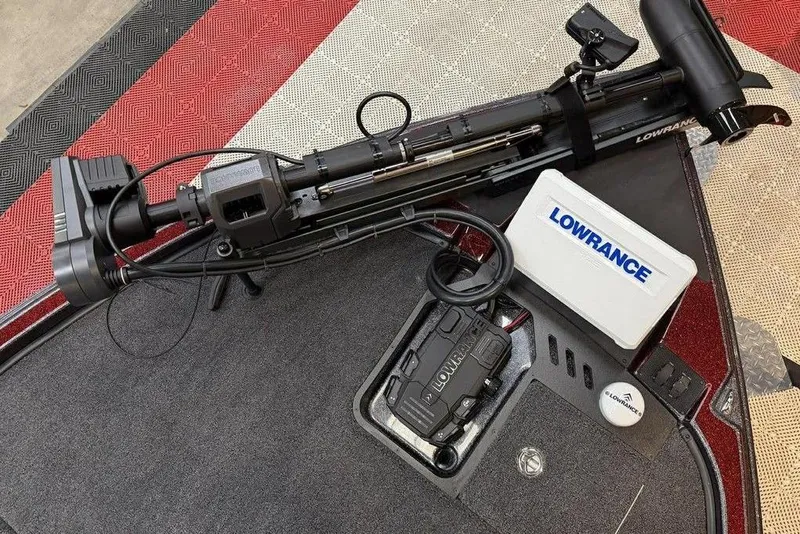 Slide: The Image of Triton 20XP Patriot 2026 boat deck with Lowrance equipment and trolling motor. - 7