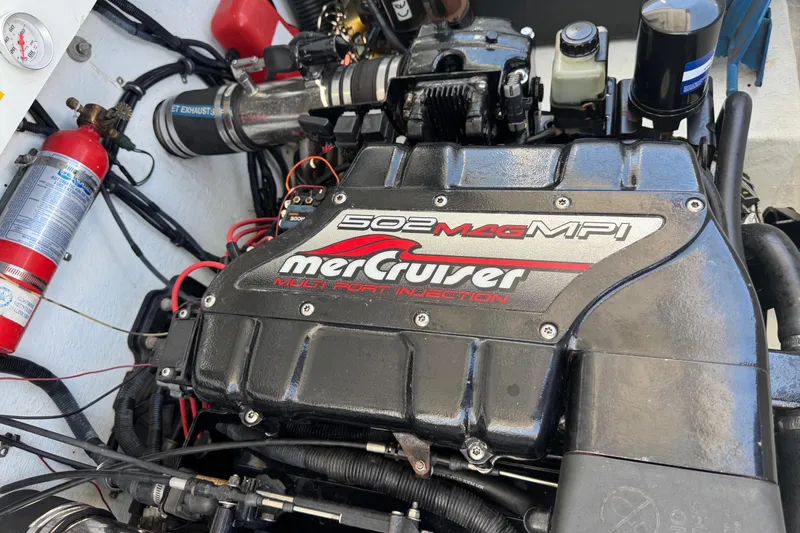 Slide: The Image of Engine of a 1999 Baja 25 Outlaw boat with MerCruiser 502 MAG MPI. - 20
