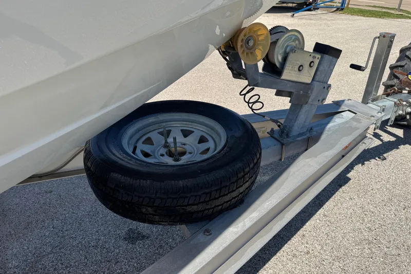 Slide: The Image of Trailer with spare tire for 1999 Baja 25 Outlaw boat. - 5
