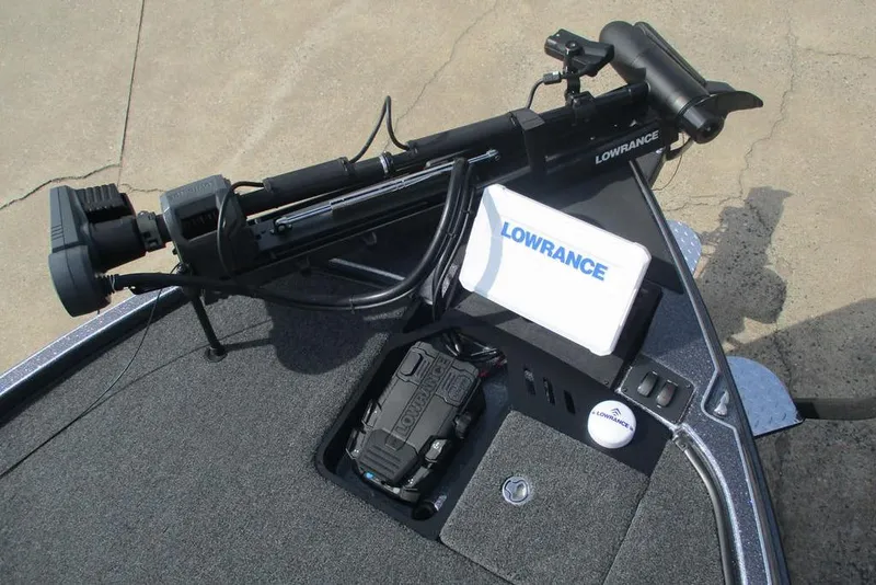 Slide: The Image of Triton 20XP Patriot 2026 boat with Lowrance electronics and trolling motor on deck. - 10