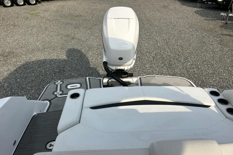 Slide: The Image of 2023 Four Winns HD8 OB boat with outboard motor, rear deck view. - 7