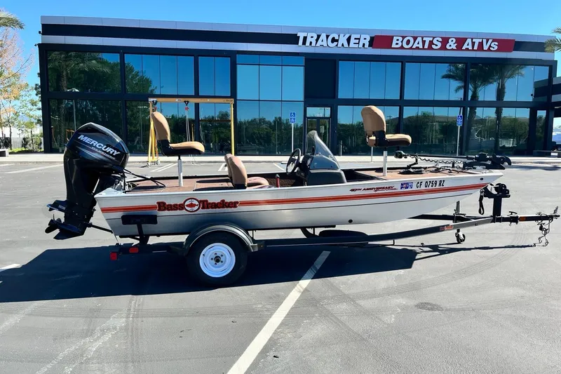 Slide: The Image of 2018 TRACKER BOAT Classic 18 with Mercury engine parked outside dealership. - 6