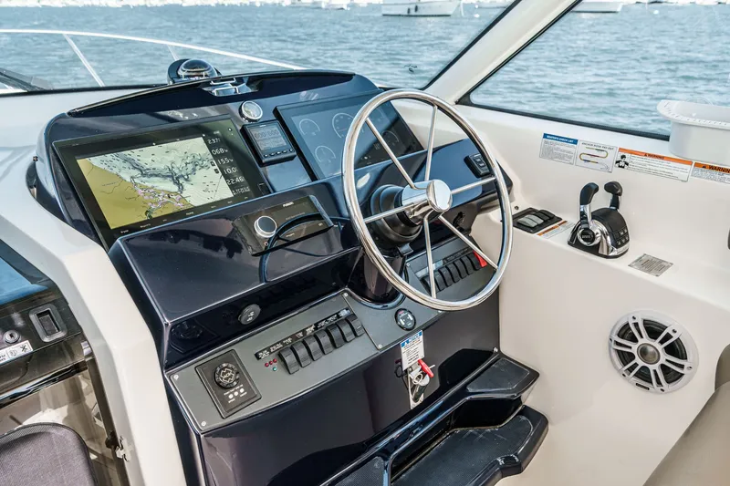 Slide: The Image of 2018 Tiara Yachts 43 Open helm with navigation system. - 25