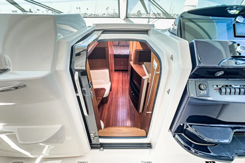 Slide: The Image of Interior of 2018 Tiara Yachts 43 Open with wooden flooring. - 32