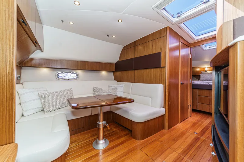 Slide: The Image of Interior of 2018 Tiara Yachts 43 Open with elegant wood finish. - 34
