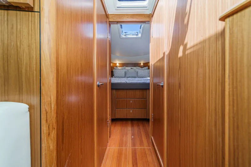 Slide: The Image of Interior of 2018 Tiara Yachts 43 Open with wood finish. - 42