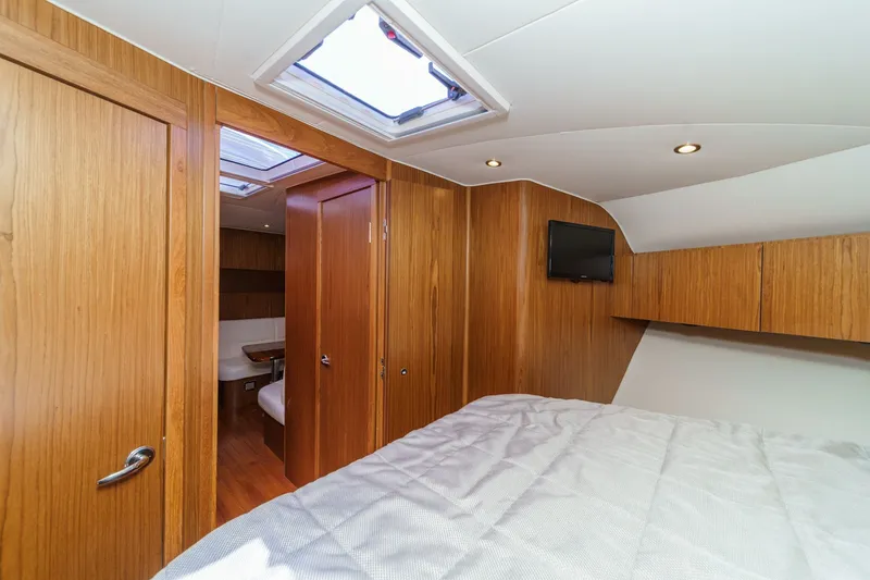 Slide: The Image of Interior of 2018 Tiara Yachts 43 Open with wood finish. - 45