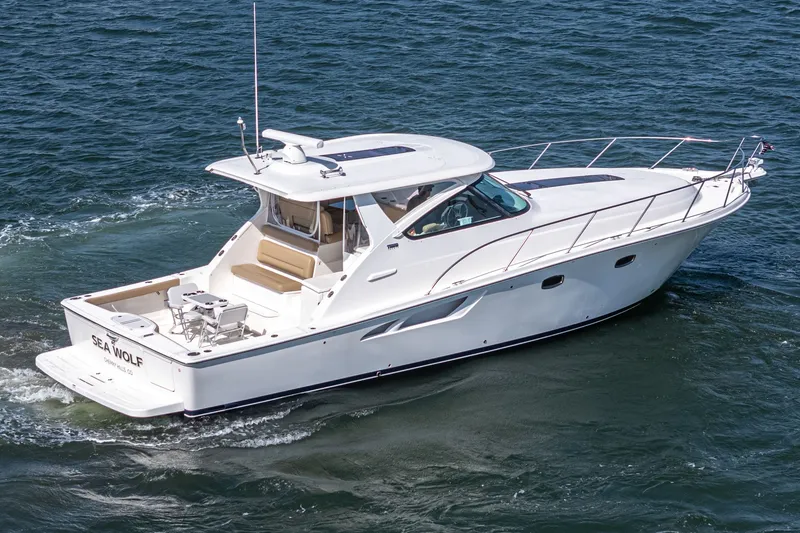 Slide: The Image of 2018 Tiara Yachts 43 Open on water, side view. - 5