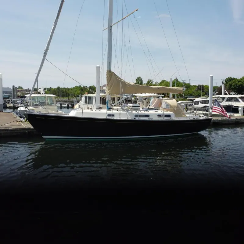 The Image of 2017 Rustler 37 sailboat docked at marina. - 0