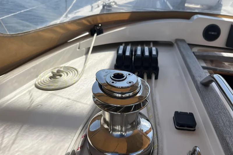Slide: The Image of Sailing equipment on a 2017 Rustler 37 yacht, featuring winch and rope details. - 18