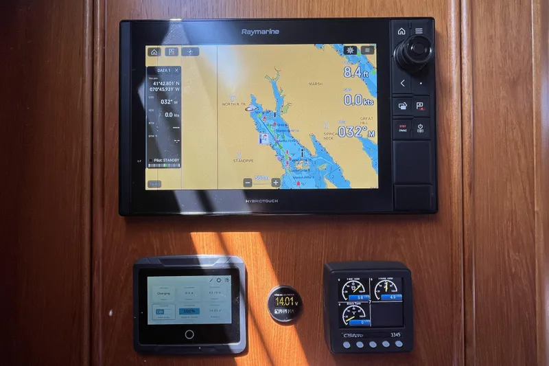 Slide: The Image of Navigation and control panel on a 2017 Rustler 37 yacht, featuring Raymarine display. - 26