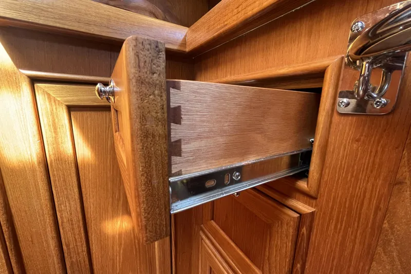 Slide: The Image of Wooden drawer detail in a 2017 Rustler 37 yacht interior. - 51