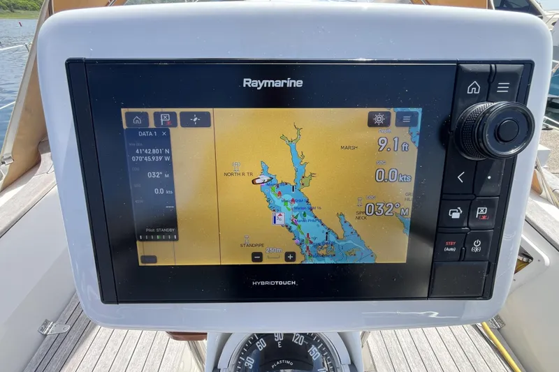 Slide: The Image of Raymarine navigation display on 2017 Rustler 37 yacht, showing nautical chart and coordinates. - 66