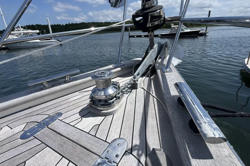 Slide: The Image of Deck of 2017 Rustler 37 yacht with anchor and winch, docked in marina. - 69