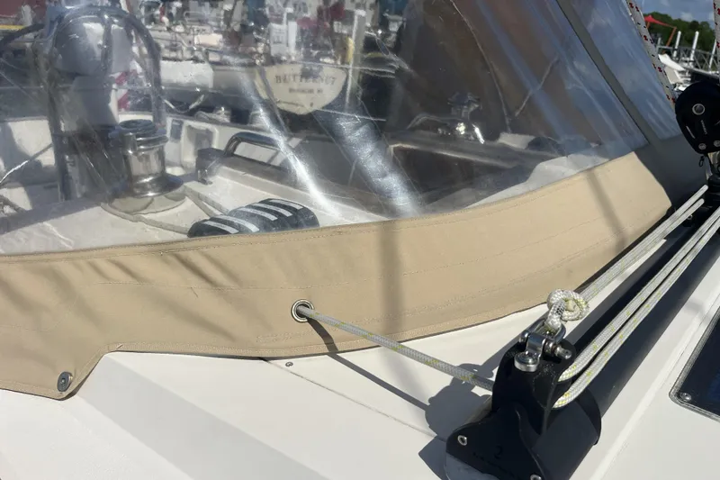 Slide: The Image of Close-up of a 2017 Rustler 37 sailboat deck with winch and rigging. - 7