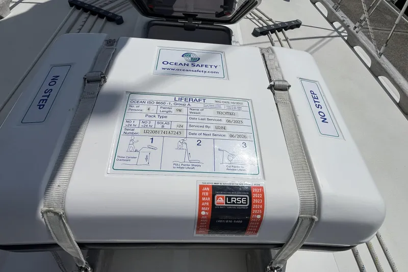 Slide: The Image of Liferaft on 2017 Rustler 37 sailboat, labeled "Ocean Safety," with service details. - 72