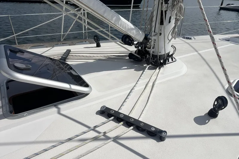 Slide: The Image of Deck of 2017 Rustler 37 sailboat with open hatch and rigging details. - 9