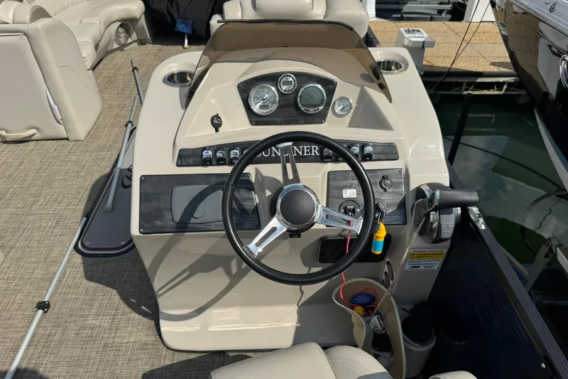 Slide: The Image of Steering console of a 2017 Harris FloteBote 240 Sunliner pontoon boat. - 10