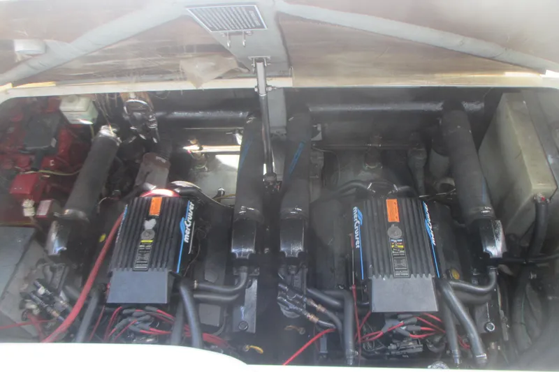 Slide: The Image of Engine compartment of a 1997 Sea Ray Sundancer 330 with dual MerCruiser engines. - 22
