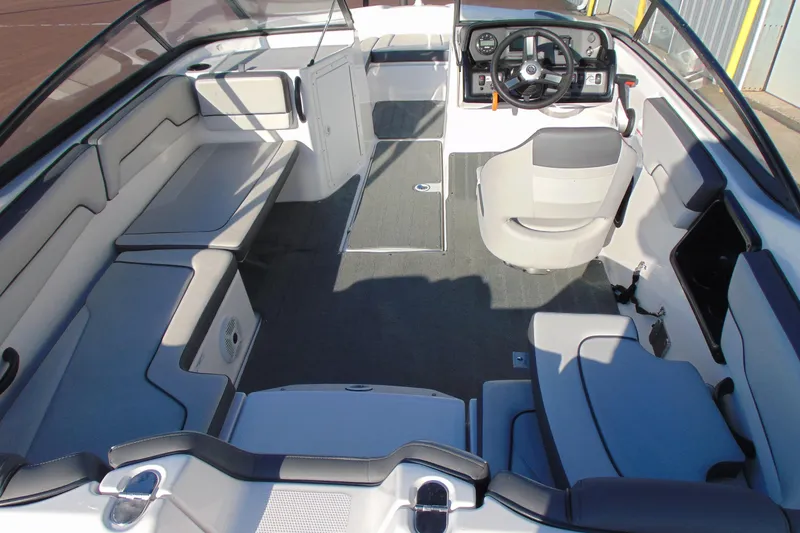 Slide: The Image of 2019 Yamaha Boats AR190 interior with seating and steering console. - 6