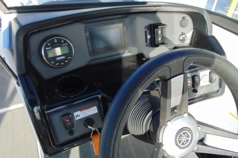 Slide: The Image of 2019 Yamaha Boats AR190 dashboard with steering wheel and control panel. - 9