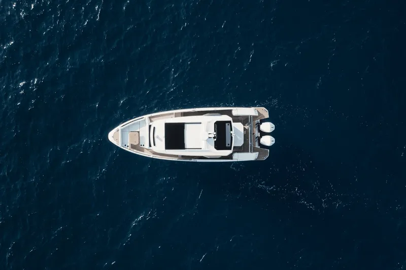 Slide: The Image of Aerial view of a 2027 Saxdor 340 GTWA boat on open water. - 5