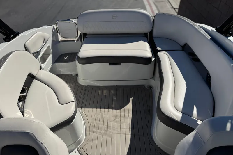 Slide: The Image of 2020 Crownline Eclipse E255 SURF boat interior with luxurious seating and modern design. - 24