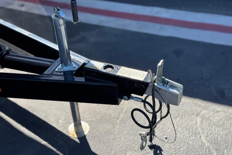 Slide: The Image of Trailer hitch of a 2020 Crownline Eclipse E255 SURF on pavement. - 40