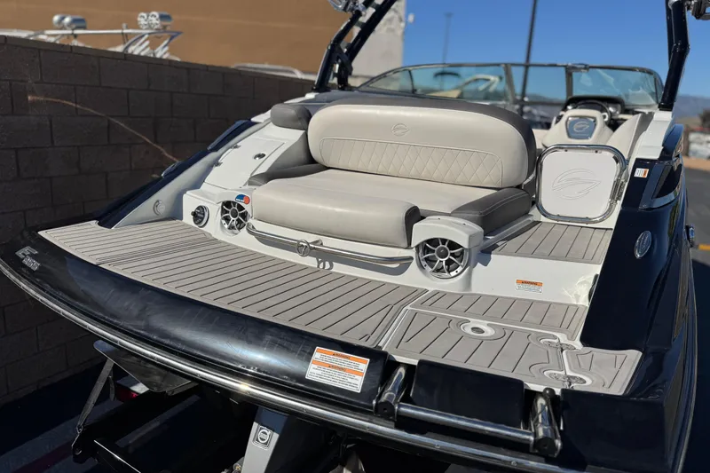 Slide: The Image of 2020 Crownline Eclipse E255 SURF boat with sleek seating and modern design. - 6
