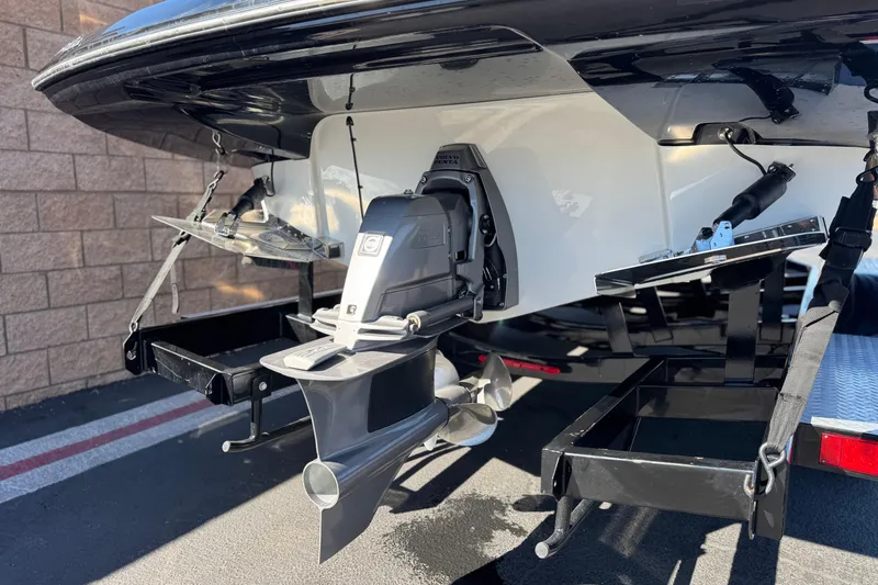 Slide: The Image of 2020 Crownline Eclipse E255 SURF boat stern with Volvo Penta outdrive. - 7