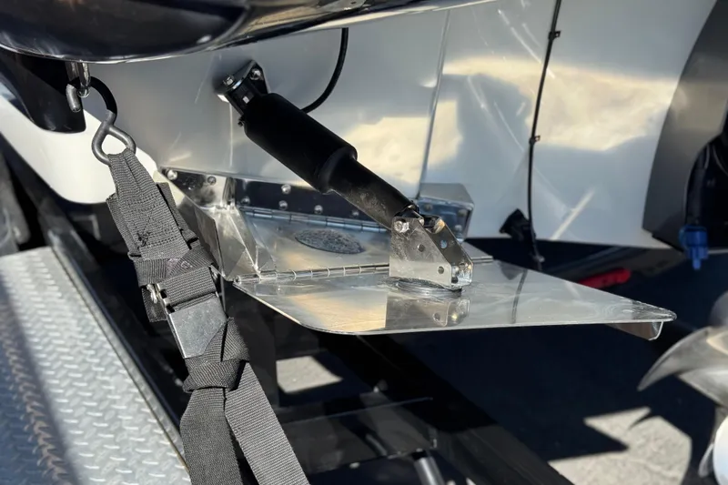 Slide: The Image of 2020 Crownline Eclipse E255 SURF boat trim tab and hydraulic system close-up. - 9